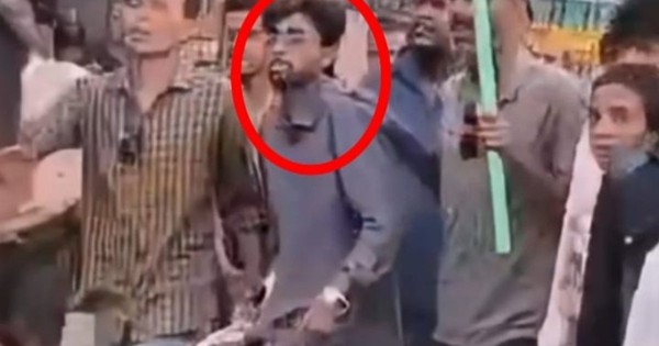 ফরিদপুরে বিএনপির দুই পক্ষের সংঘর্ষে অস্ত্র হাতে যুবক কে?